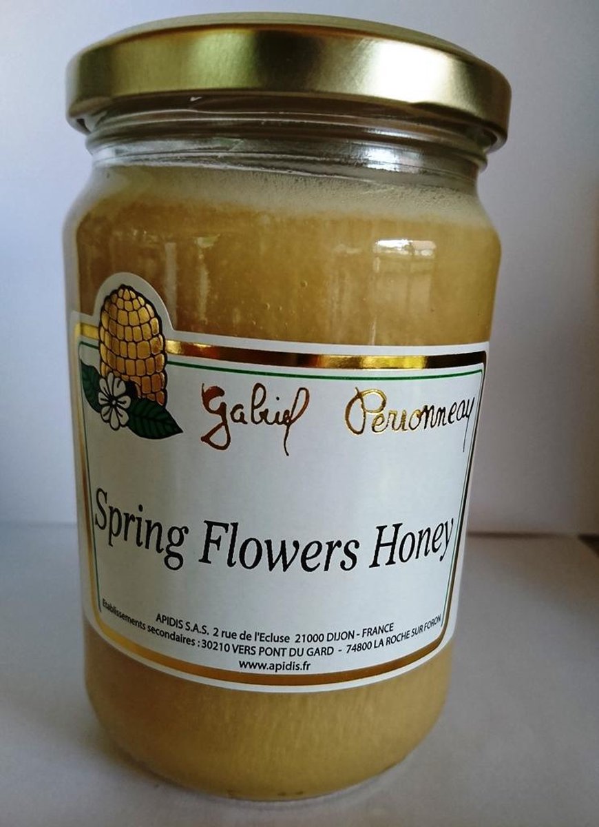 Honing lentebloemen vloeibaar honingpot met honinglepel