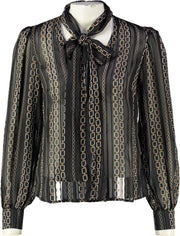 Morgan semi transparante blouse met pofmouwen en glitterdraad - valt kleiner - Maat 40