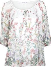 Blouse in zijde met bloemenprint