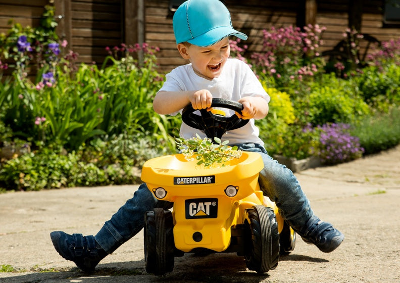 looptractor RollyMinitrac Dumper Cat junior geel