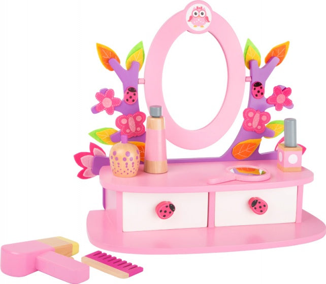 kleurrijke houten make-up tafel roze